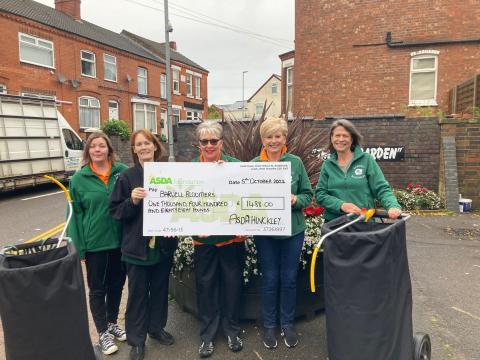 Receiving the cheque from ASDA